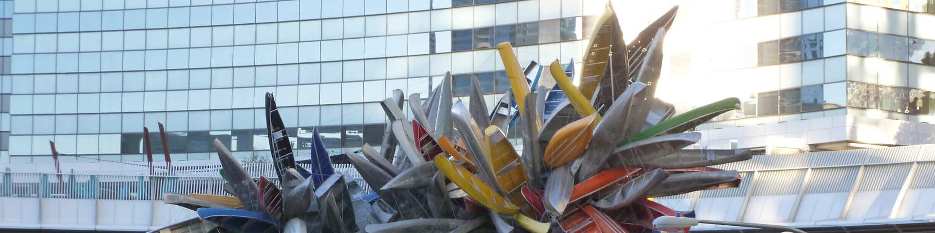 Very large sculpture composed of full size canoes. Taken from the north entrance at Aria. Access off of Harmon just west of LV Blvd.