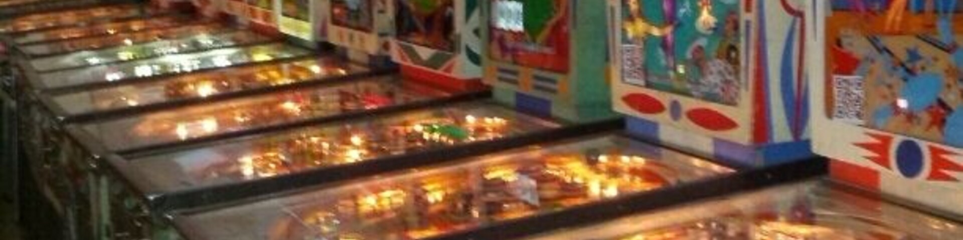 Aisles and aisles of vintage pinball machines and other arcade blasts from the past.