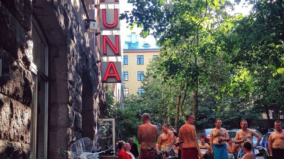 If you are in Helsinki, Finland, you have to try a sauna! It's a fantastic way to relax after a long day of visiting the city.
Getting completely naked amidst a group of strangers may sound intimidating, but it's really not such a big deal once you do it. Locals enjoy meeting their friends at the sauna for a chat, much like I might meet up with my friends for a coffee at home. There's nothing sexual about it, and men and women have separate saunas. Even though it can be a bit strange for visitors at first, once you relax the sauna is a wonderfully enjoyable experience.
You sit in the hot, dark room until it gets too warm to bear. Then, you duck out for a quick cooling shower, or a roll in the snow if it's winter! You can also play games or have a beer with your friends outside in between steaming sessions. Finish off with a long shower and a shot of vodka for the complete experience!