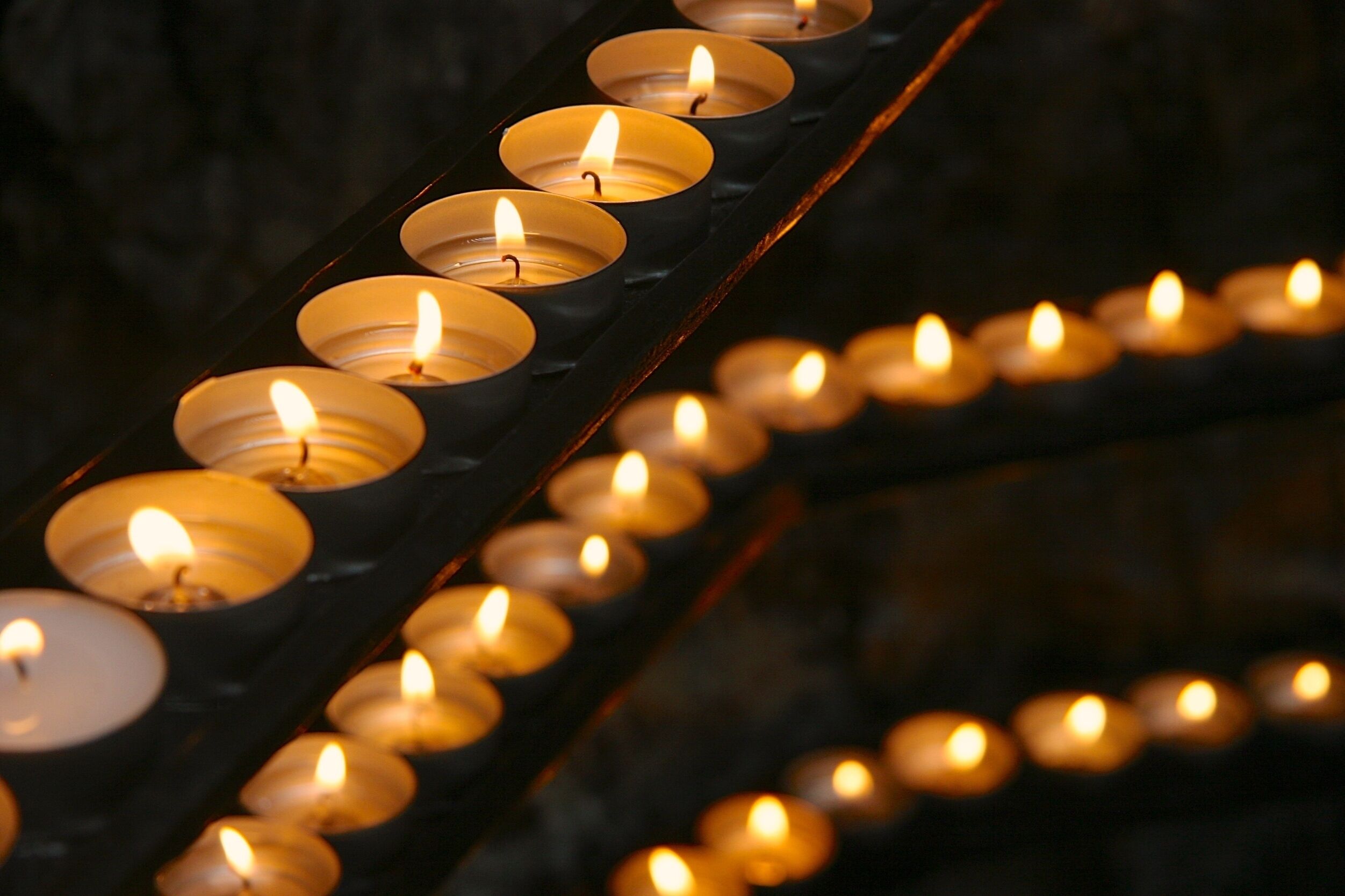 Candles are always a treat to photograph. I especially liked how the three lines of candle trays lead the eye around the image, and how I could play with the focus to have each layer less focused than the last. 

#golden