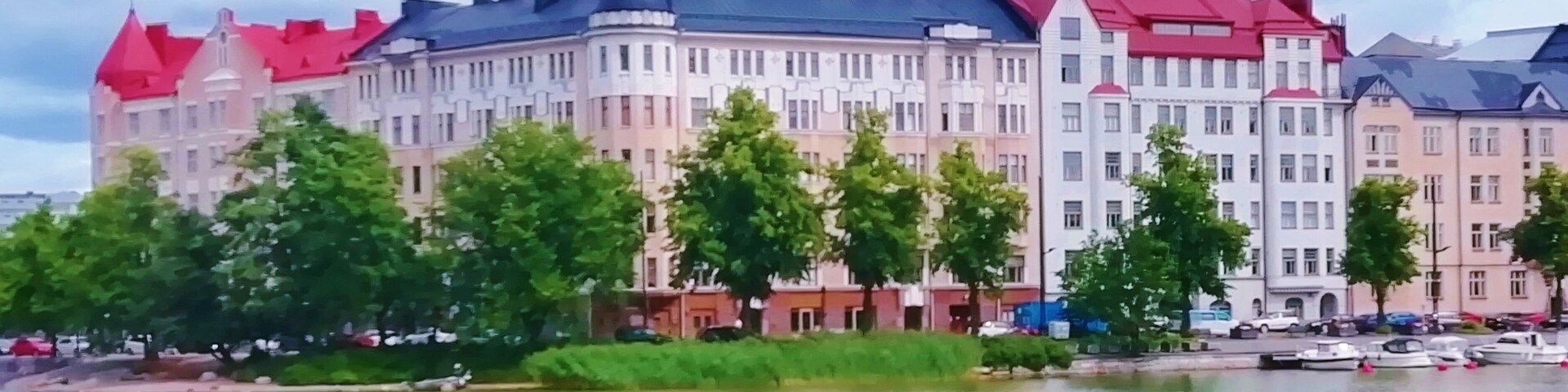 Beautiful houses in Helsinki. View over Kaisaniemenlahti (Bay of Kaisaniemi) to Siltasaari.