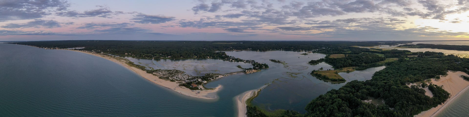 Sunset along the beach at Towd Point in Southampton, Long Island, New York.