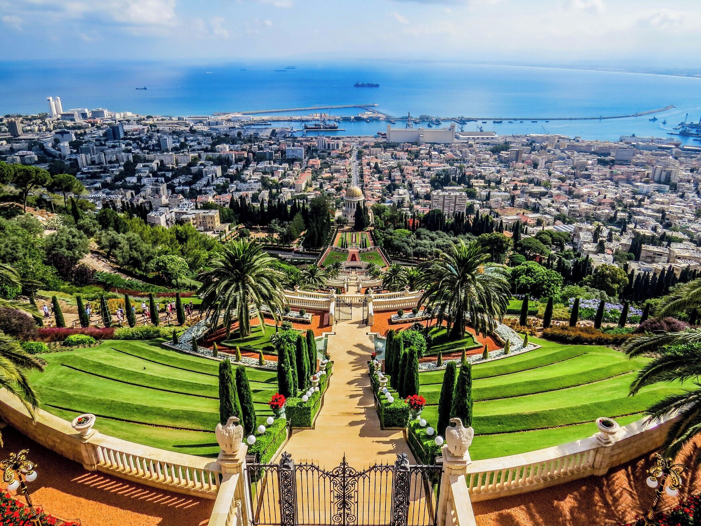 Bahá'í Gardens in Haifa, Israel. It comprises a staircase of nineteen terraces extending all the way up the northern slope of Mount Carmel. Bahá'í is a monotheistic religion which emphasizes the spiritual unity of all humankind.