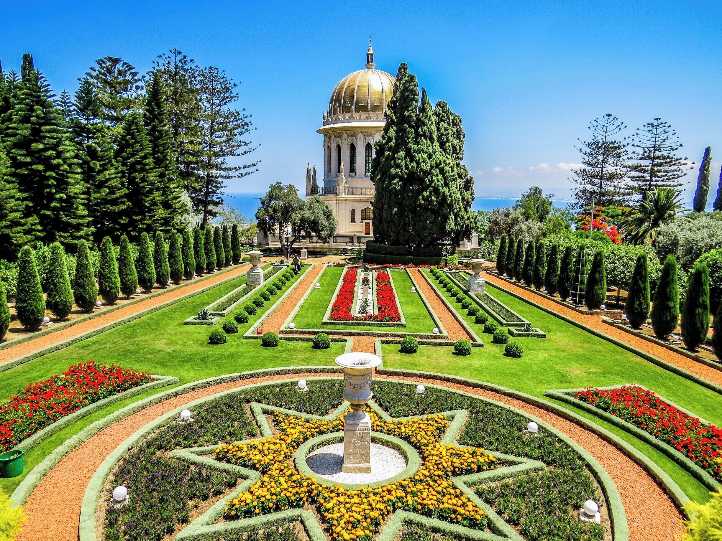Bahá'í Gardens in Haifa, Israel. It comprises a staircase of nineteen terraces extending all the way up the northern slope of Mount Carmel. Bahá'í is a monotheistic religion which emphasizes the spiritual unity of all humankind.