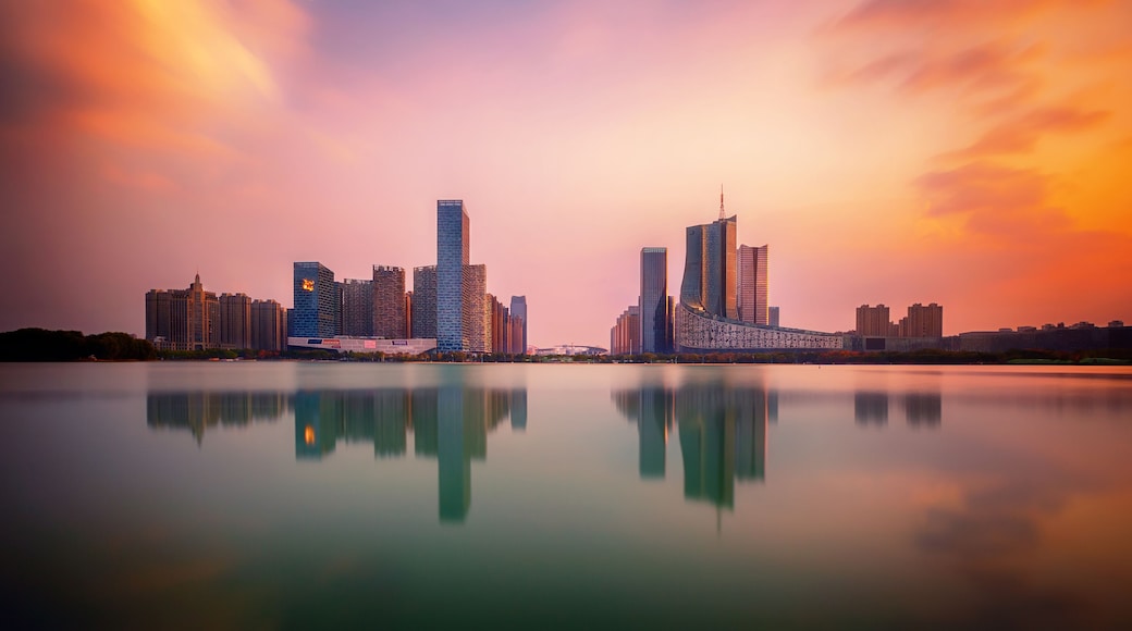 sunset over Swan Lake financial business district, Hefei city, China