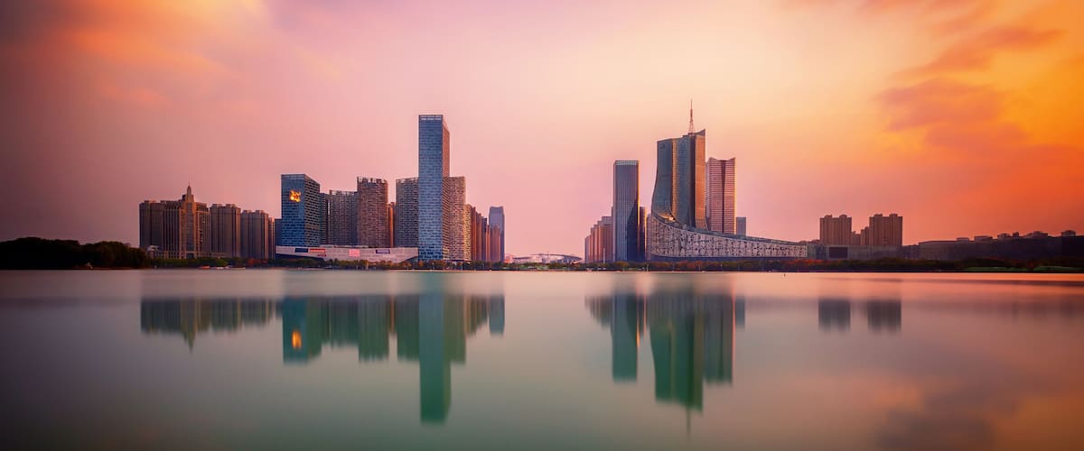 sunset over Swan Lake financial business district, Hefei city, China