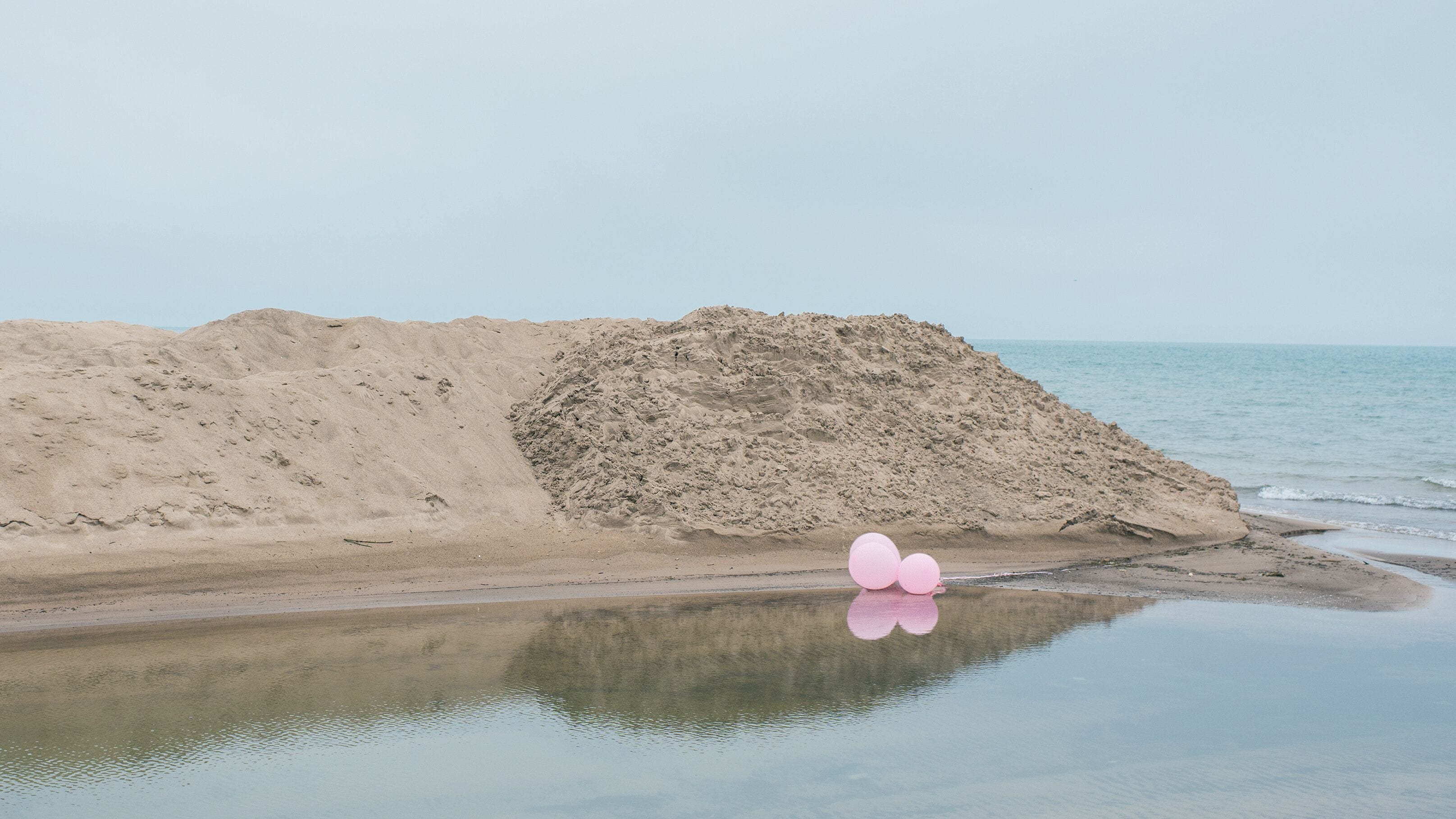 helium balloons on Lake Michigan sand dunes near Pentwater. USA
