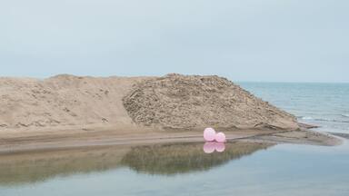 helium balloons on Lake Michigan sand dunes near Pentwater. USA