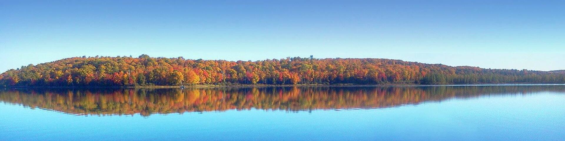 Autumn scenery looking across Slaughter Bay on Lac Vieux Desert.