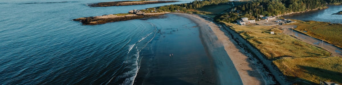 Head Beach coastline and forrest at sunrise. Phippsburg, Maine, United States.