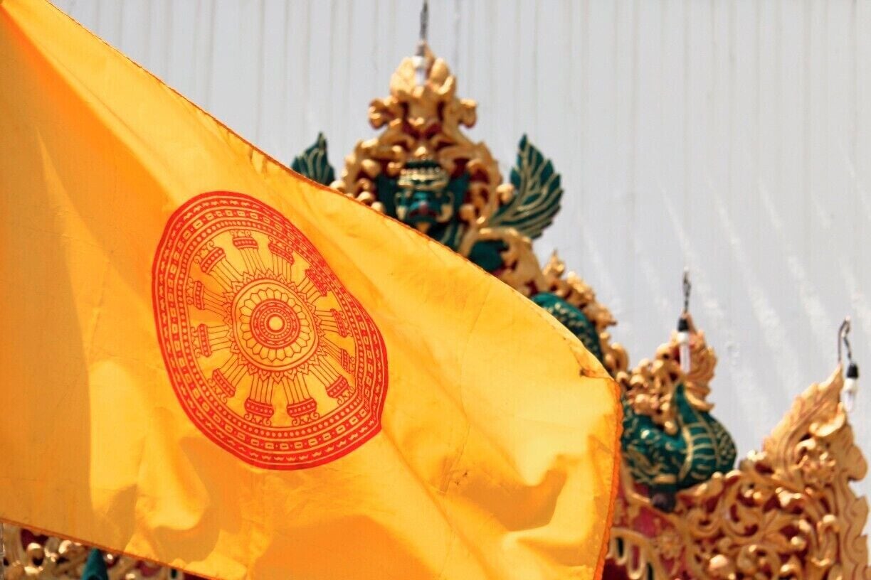 Taken at one of the Buddhist Temples in town, the 12 spokes of the Dharma Wheel represent the 12 laws of dependent origination or the twelve permutations of the four noble truths.