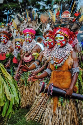 After travelling to over 50 countries in the last few years, there has been nothing that has had an impact on me as much as the Mount Hagen Sing Sing in Papua New Guinea.
Every year, 50 to 100 different tribes arrive early in the morning to an open field. There, they don their face paint, beads, shell necklaces, grass skirts, and drums.
Most importantly they construct their elaborate headresses on site. For example, the Simbu Traditional headress is one of the most colorful traditional headdreses in the Highland Region. The front feathers are from the red parrot feathers. The green ones in the middle are from green parrots feathers and on the top are the Stephanie’s Astrapia Bird of Paradise feathers.
When all these feathers are put into place they are tightened by a headband made of bamboo or bush veins and decorated by cuscus fur or sometimes cassowary feathers.
In Simbu tradition the Headdress plays a virtual role of identifying the status of a dancer in the society. The wealthy family is the one with more feathers and has the attractive headdress decorations.
At noon, they enter the parade grounds. They beat their drums, chant, sing and march around the open field. Visitors are allowed to get “up and personal” and take as many photos as they wish.
You’ll often see people lying on the ground to get a good shot of the headdress, only because they are often 3 ft. tall.
It’s an amazing site!
#FindingtheUniverse