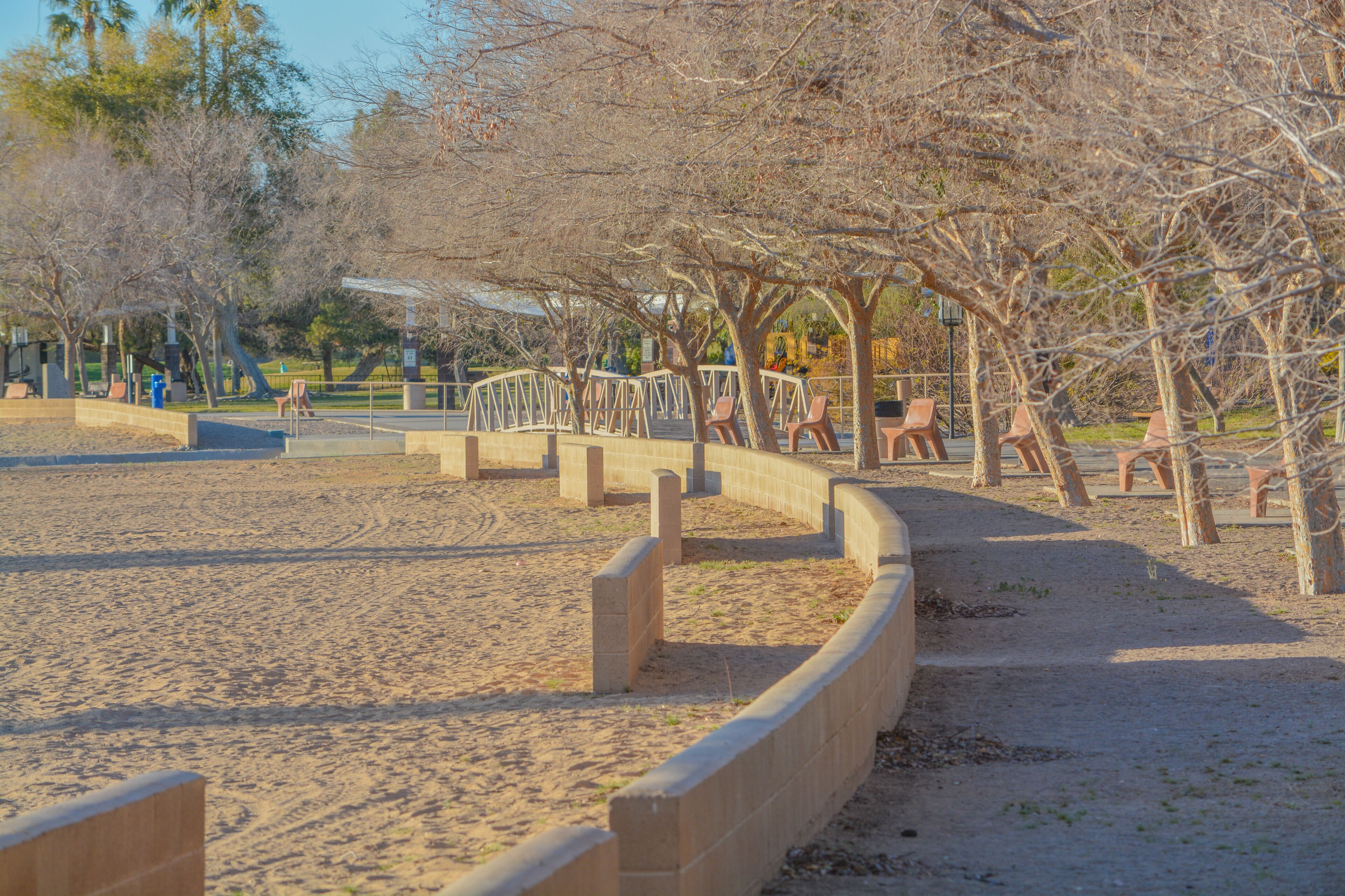 A walkway and beach along the Colorado River at the Rotary Community Park in Lake Havasu City, Arizona USA