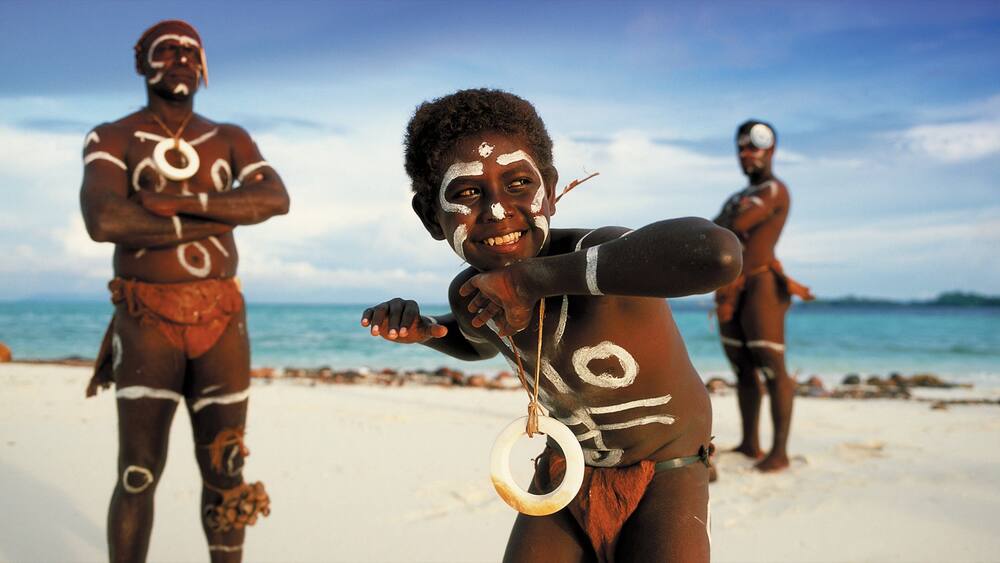 Honiara featuring a sandy beach and indigenous culture as well as an individual child