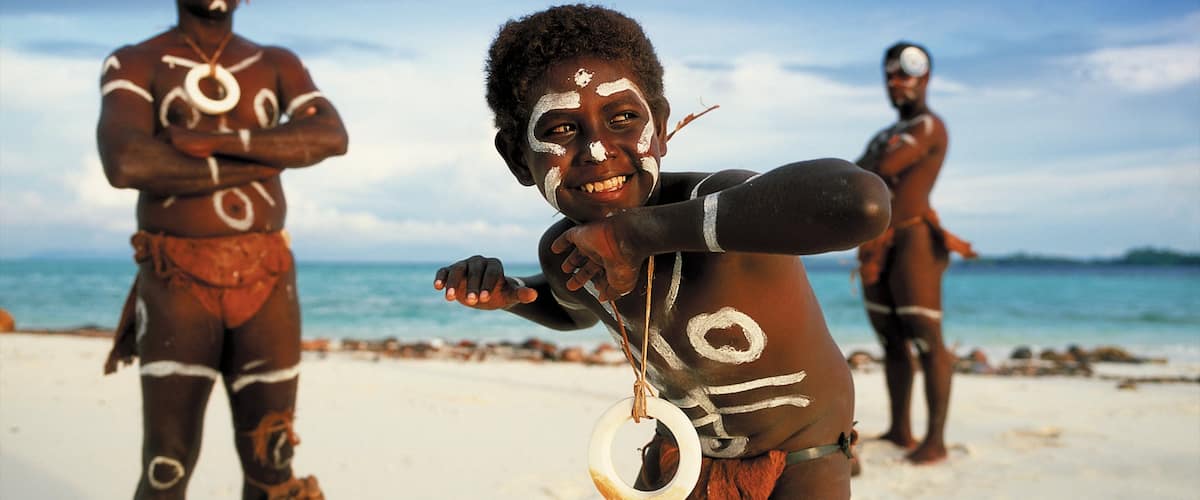 Honiara featuring a sandy beach and indigenous culture as well as an individual child