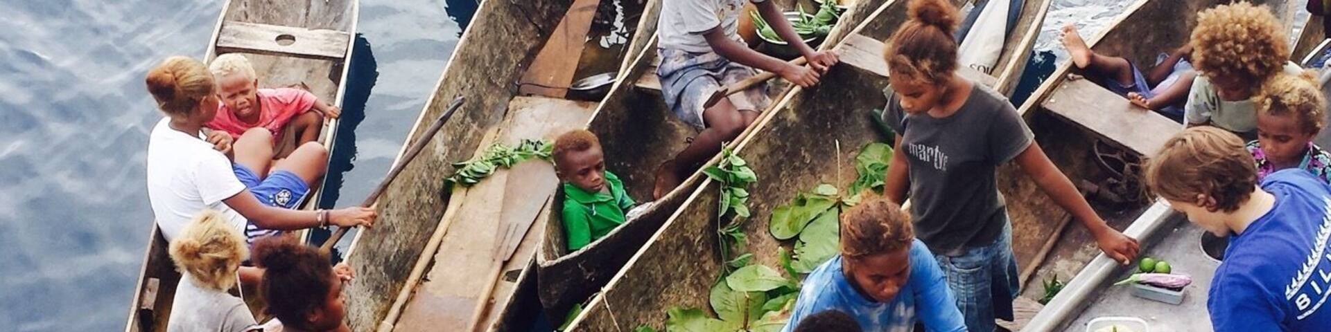 Locals selling fresh produce to us aboard our dive boat in the Solomon Islands.