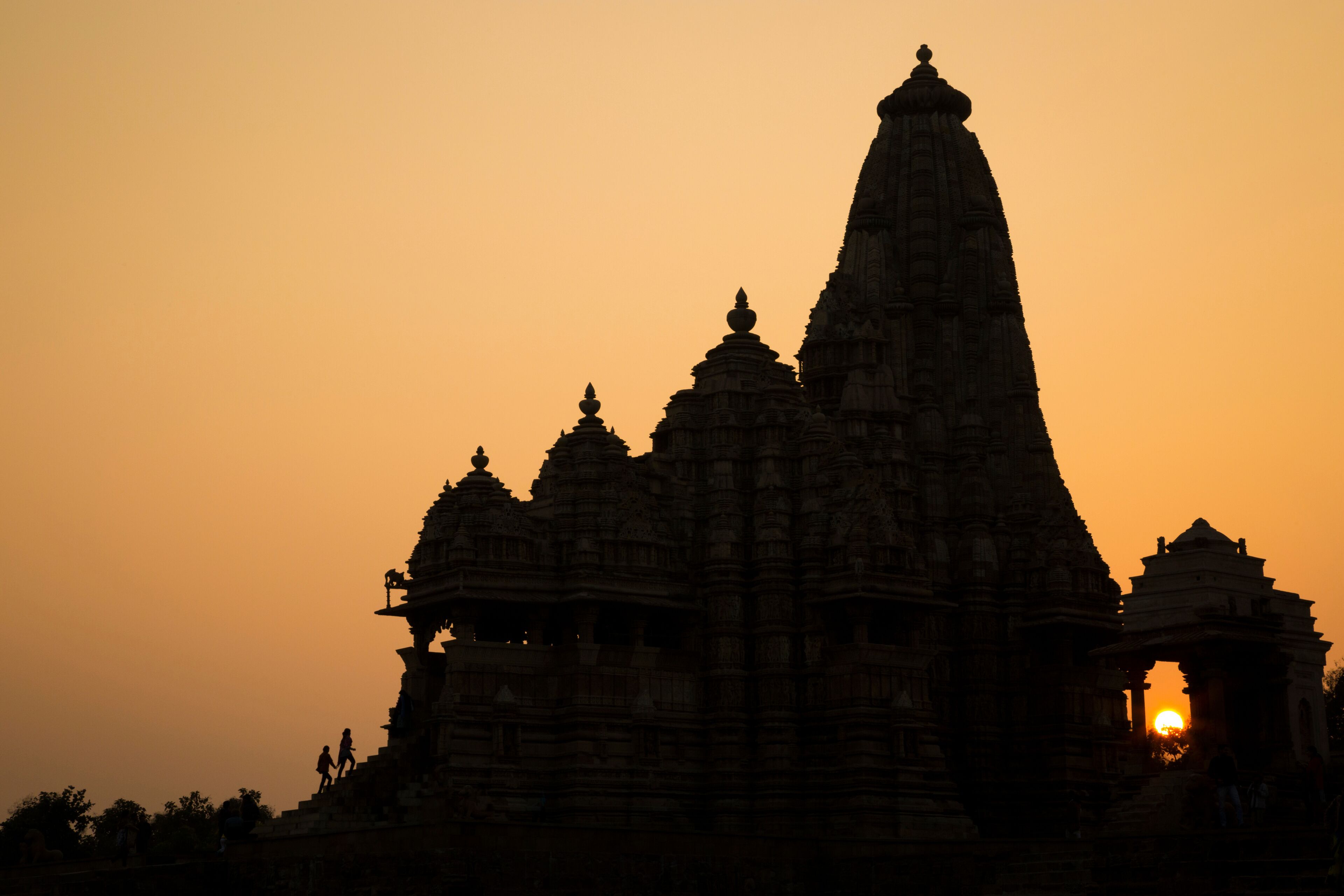 Tourists visiting Lakshmana Temple in Khajuraho India.