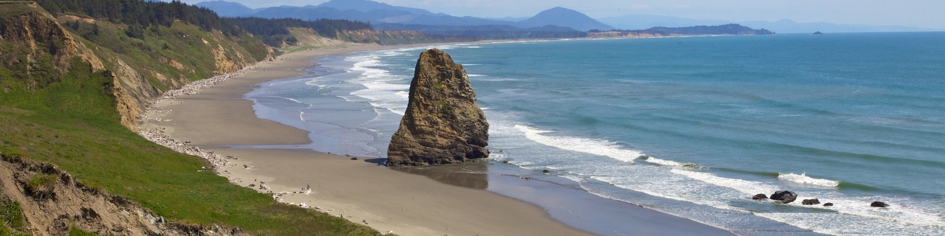 Port Orford featuring landscape views, general coastal views and a sandy beach