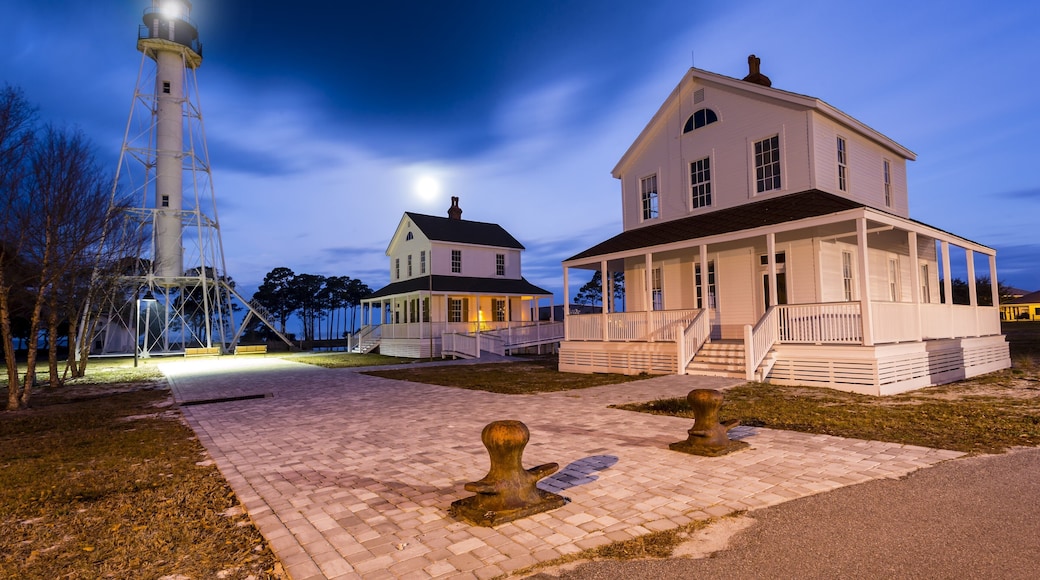 Beautiful old lighthouse being lit by a full moon just before dawn #BVSBLUE