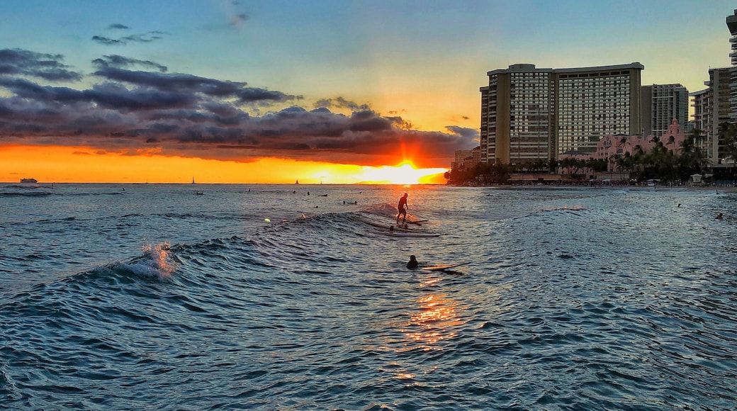 Sunset drone photo of a surfer.