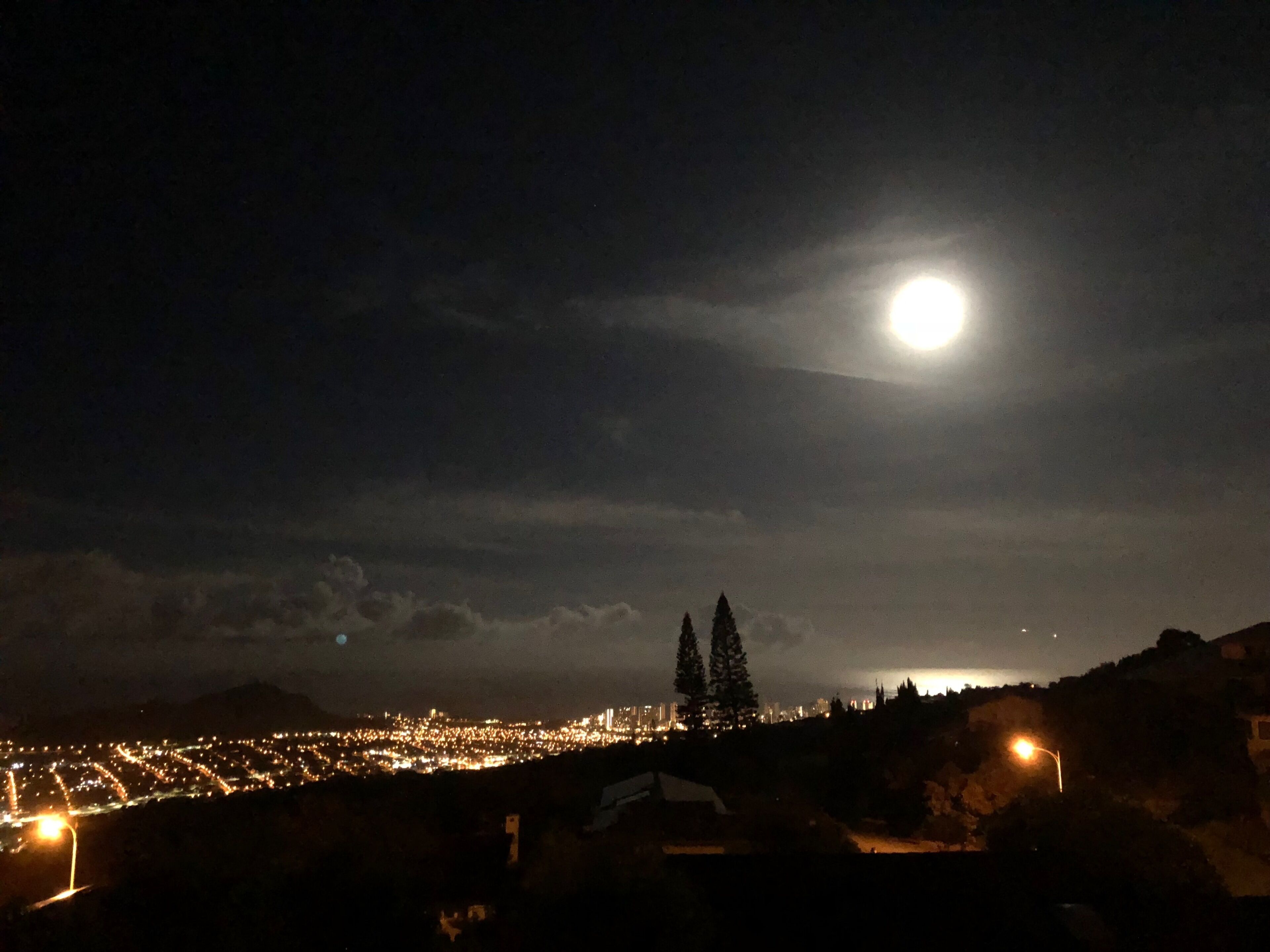 Moonset over Waikiki this morning.