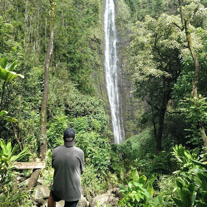 After a 2 mile walk through the 7 Sacred Pools of Ohe'o and a bamboo forest you finally stumble upon the Waimoku Falls. This is my husband taking in the beauty of the moment. Unforgettable. 