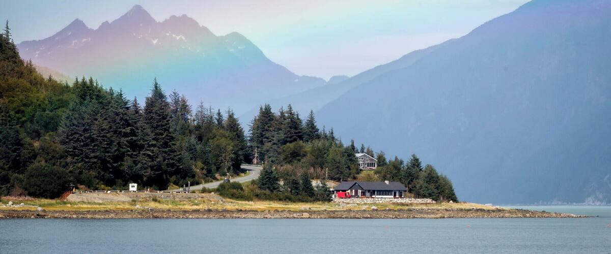 From a catamaran, I captured a pic of a coastal home under a rainbow. So beautiful.