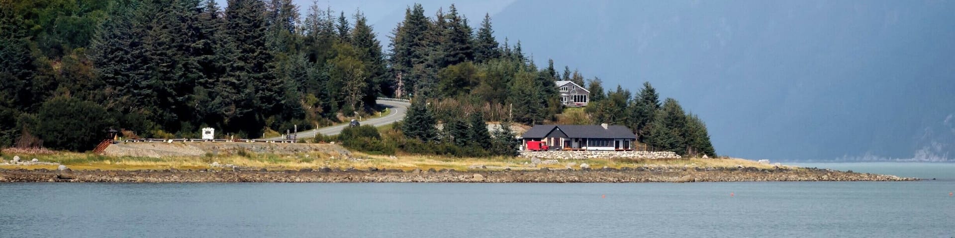 From a catamaran, I captured a pic of a coastal home under a rainbow. So beautiful.
