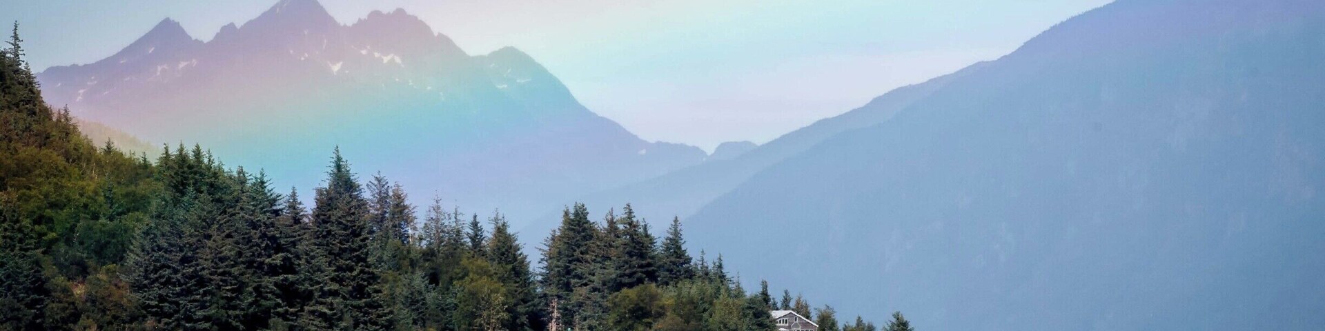 From a catamaran, I captured a pic of a coastal home under a rainbow. So beautiful.