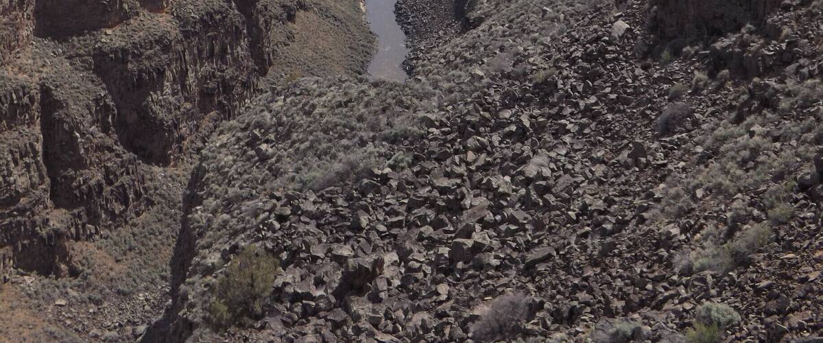 A canyon with a river running through it.