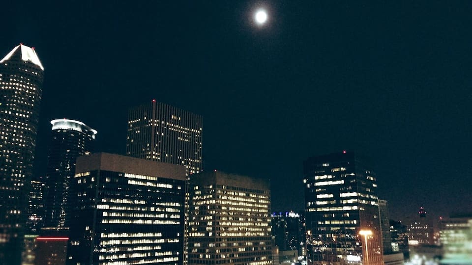Sitting by the rooftop pool, gazing at the moon in midtown Houston. Winter time is when Houston really shines. It is a season characterized by bright clear days and brisk moonlit nights. It's a city that gets a lot of precipitation, but when the clouds part it can be truly magnificent. I often say "If the weather was like this year-round, we couldn't afford to live here".