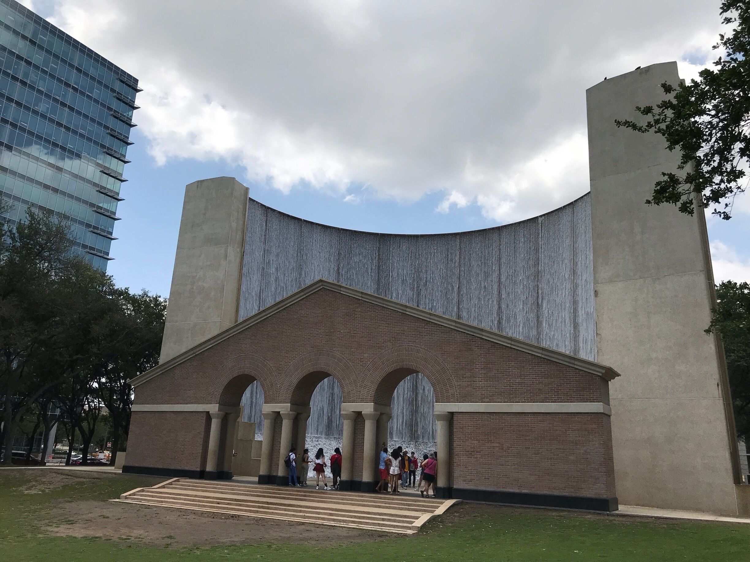 A unusual piece of art, a double sided arced  wall of falling water in Houston.  It rises about 20m or 64 feet and recirculates about 42000 lpm or 11000 gpm providing a cooling mist when up close.
