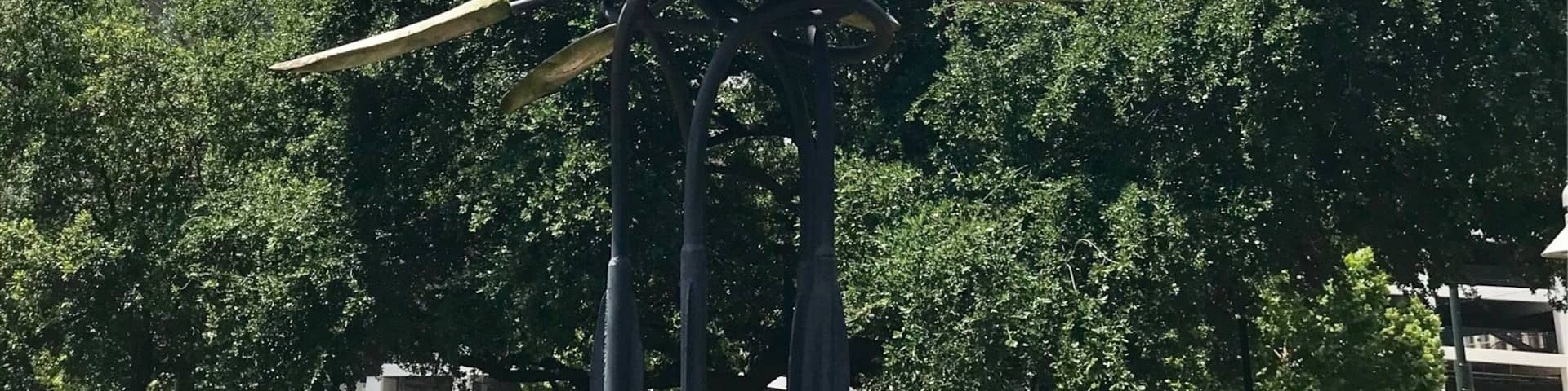 Market Square Park fountain and sculpture in downtown Houston on a hot, quiet Memorial Day Sunday.