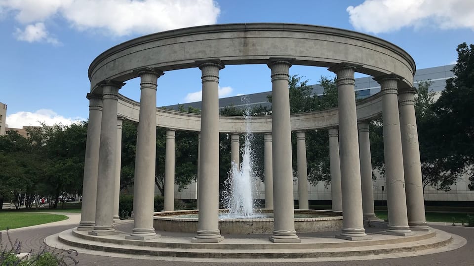 A colonnaded fountain monument near Hermann Park in Houston.