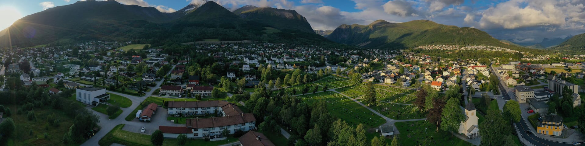 Orsta Norway cityscape. Panoramic aerial view from drone at sunset in july 2019