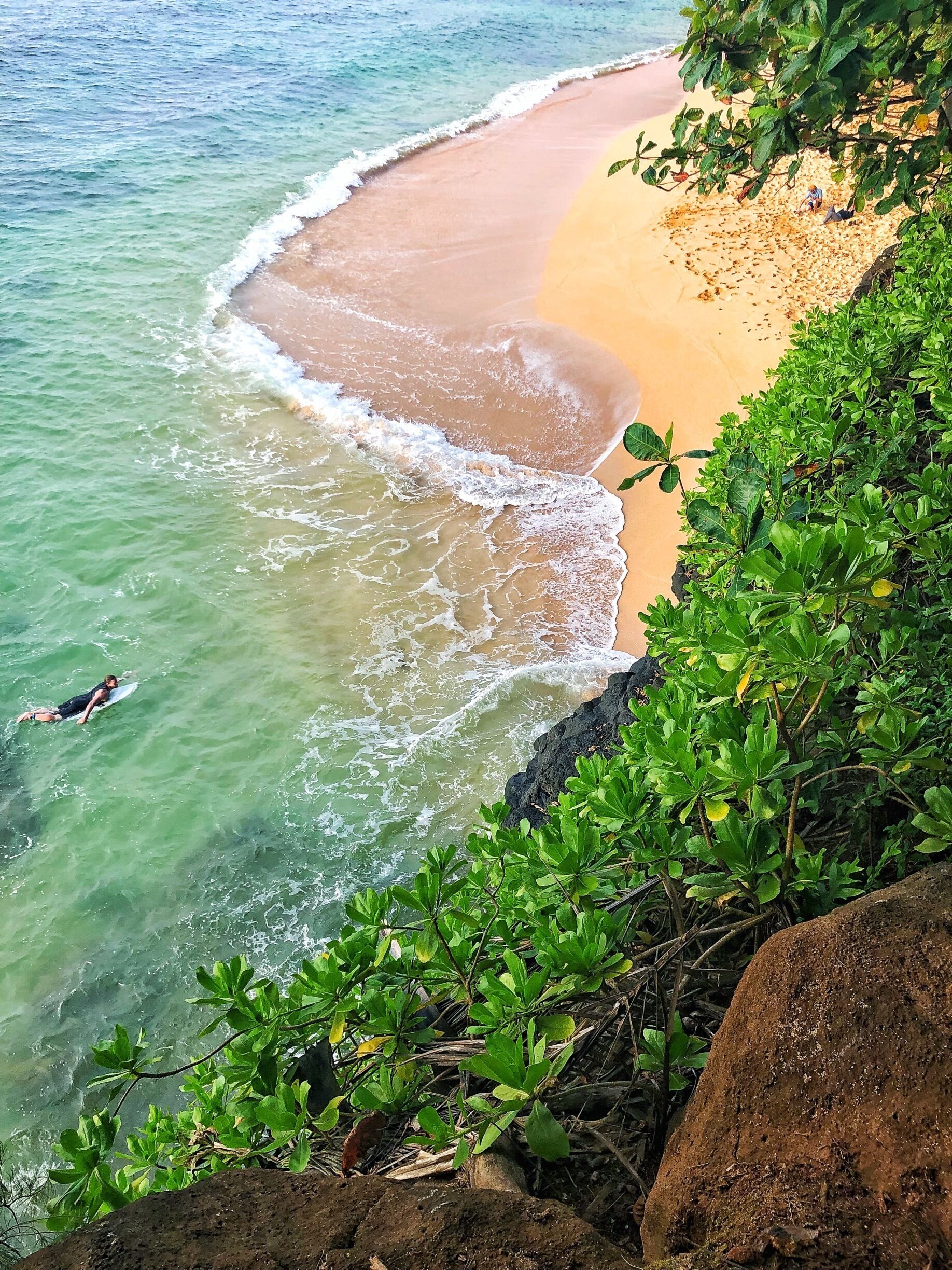 For an amazing sunset adventure Hideaways Beach at 5454 Ka Haku Rd in Princeville, Kauai, Hawaii is the place to go. From the beach parking lot you must take an interesting hike down to the beach. You will have to hold on to cables on the way down, but it’s a fun hike. Once down at the beach you’re treated to an amazing view of ocean, mountains and walls of lava catching the splashing surf!
#BeachTips photo contest