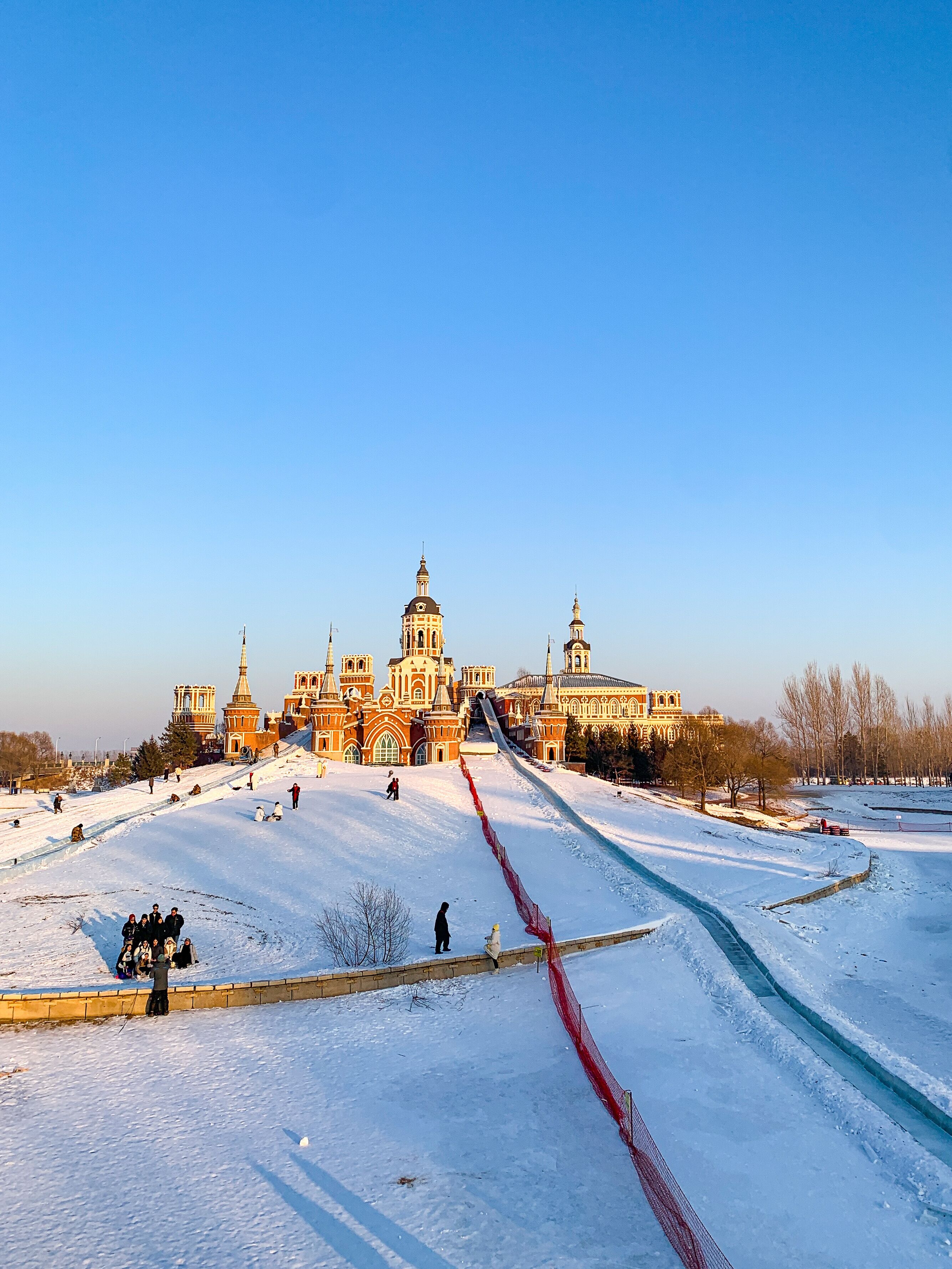 Volga manor, Russian village theme park with classic Russian architecture on a beautiful sunny winter day with a blue-sky, in Harbin, China 