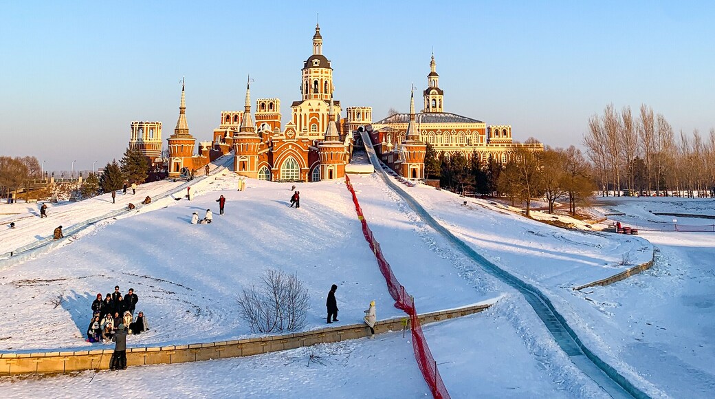 Volga manor, Russian village theme park with classic Russian architecture on a beautiful sunny winter day with a blue-sky, in Harbin, China