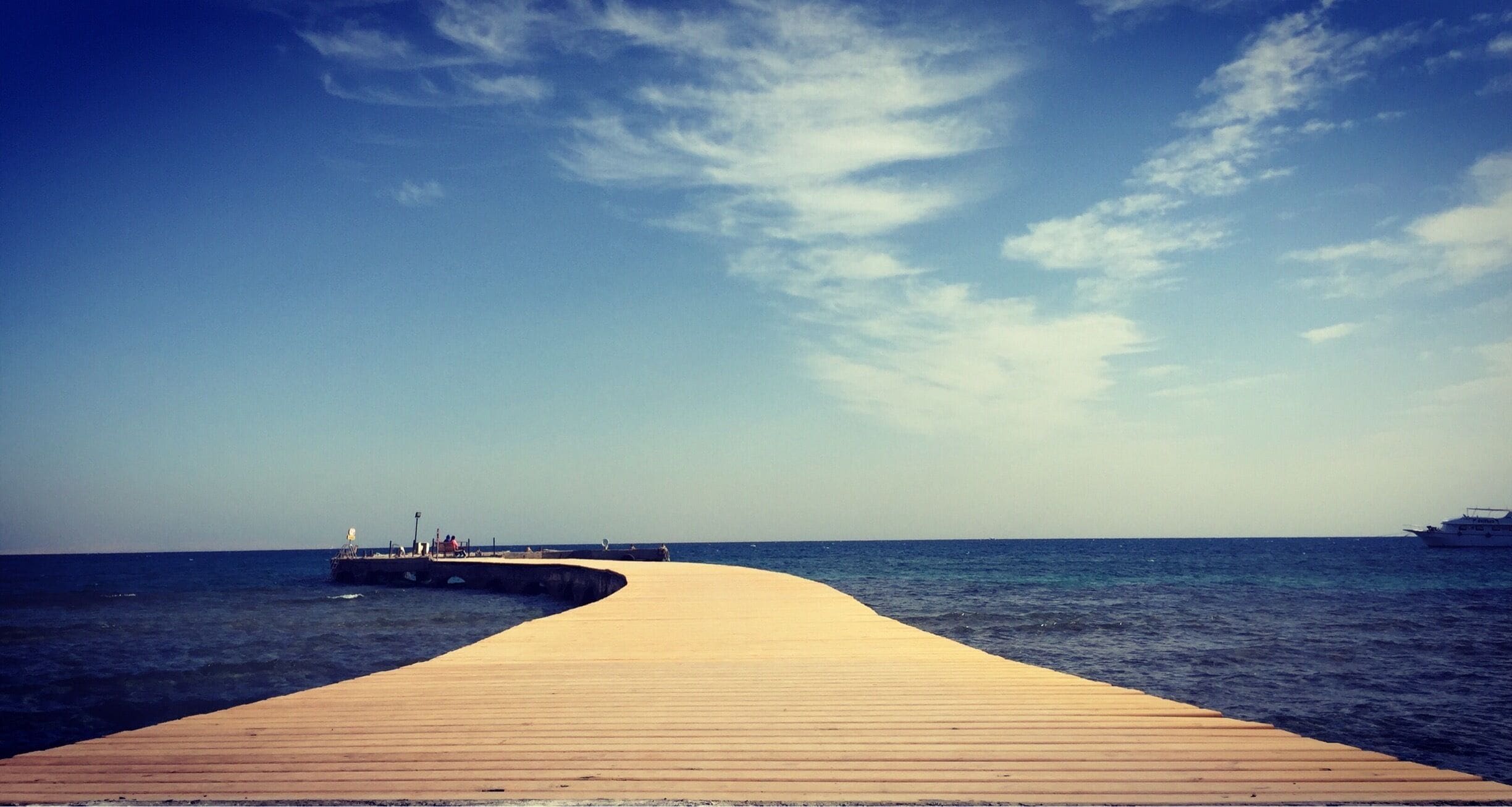 This is the same pier as before just further along. The water breaks through the planks so a clever photographer could get a great shot here!