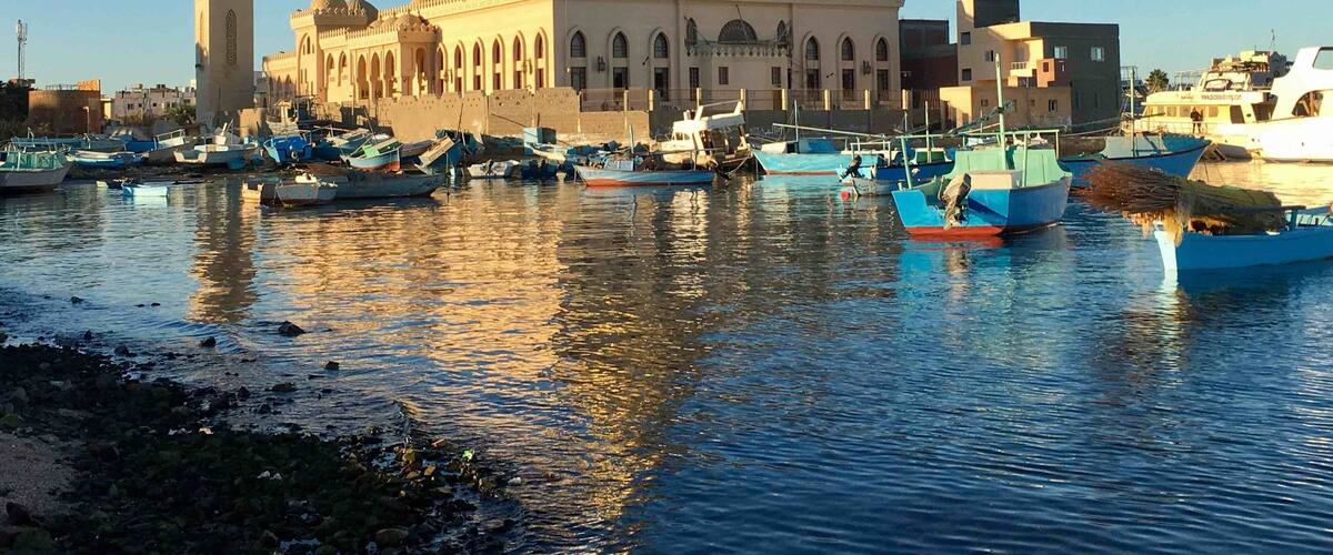 At the Hurghada Marina, Egypt, the golden Hurghada Mosque standing proudly against the blue Red Sea. #red #travel #nationalpark #hiking #architecture #nature #seascape #redsea