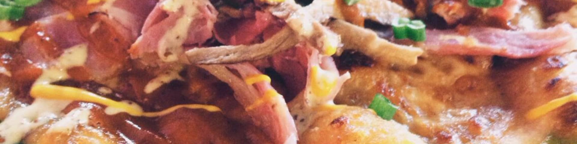 Nestled unexpectedly in the quaint strip in Robbinsdale, this unexpectedly hip pizza joint makes some of the best pizza I've EVER had. Start with the Cubano (pictured here), which has pulled pork and is actually covered and smoked). Perfect crust, fresh ingredients and stubbing flavor. Highly recommended, and great beer and wine list.