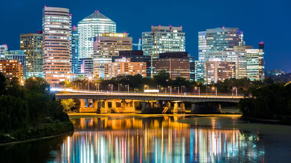Rosslyn district skyline connected to Washington DC through Theodore Roosevelt memorial bridge.