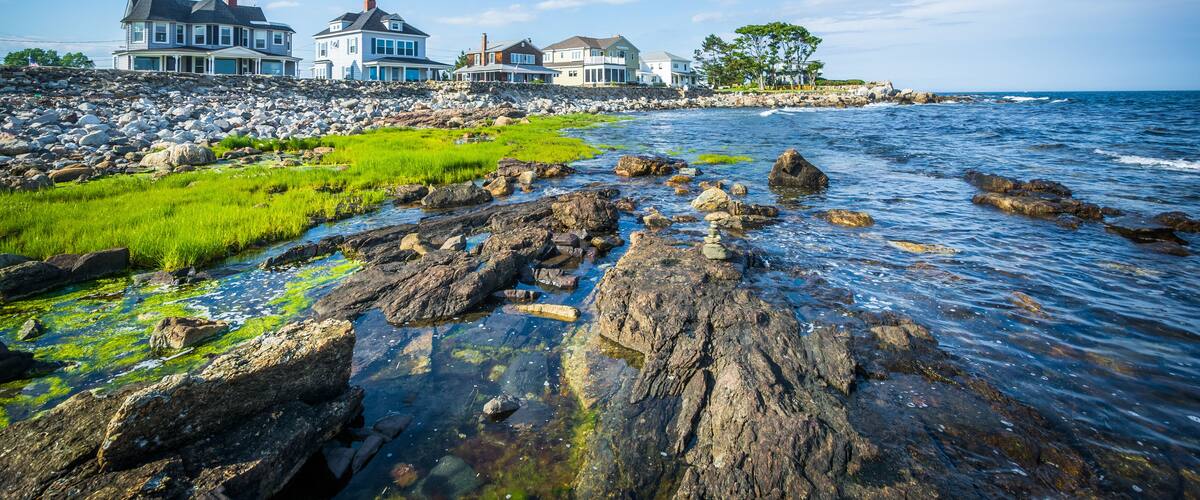 Rocky coast and beachfront homes at Concord Point, in Rye, New H
