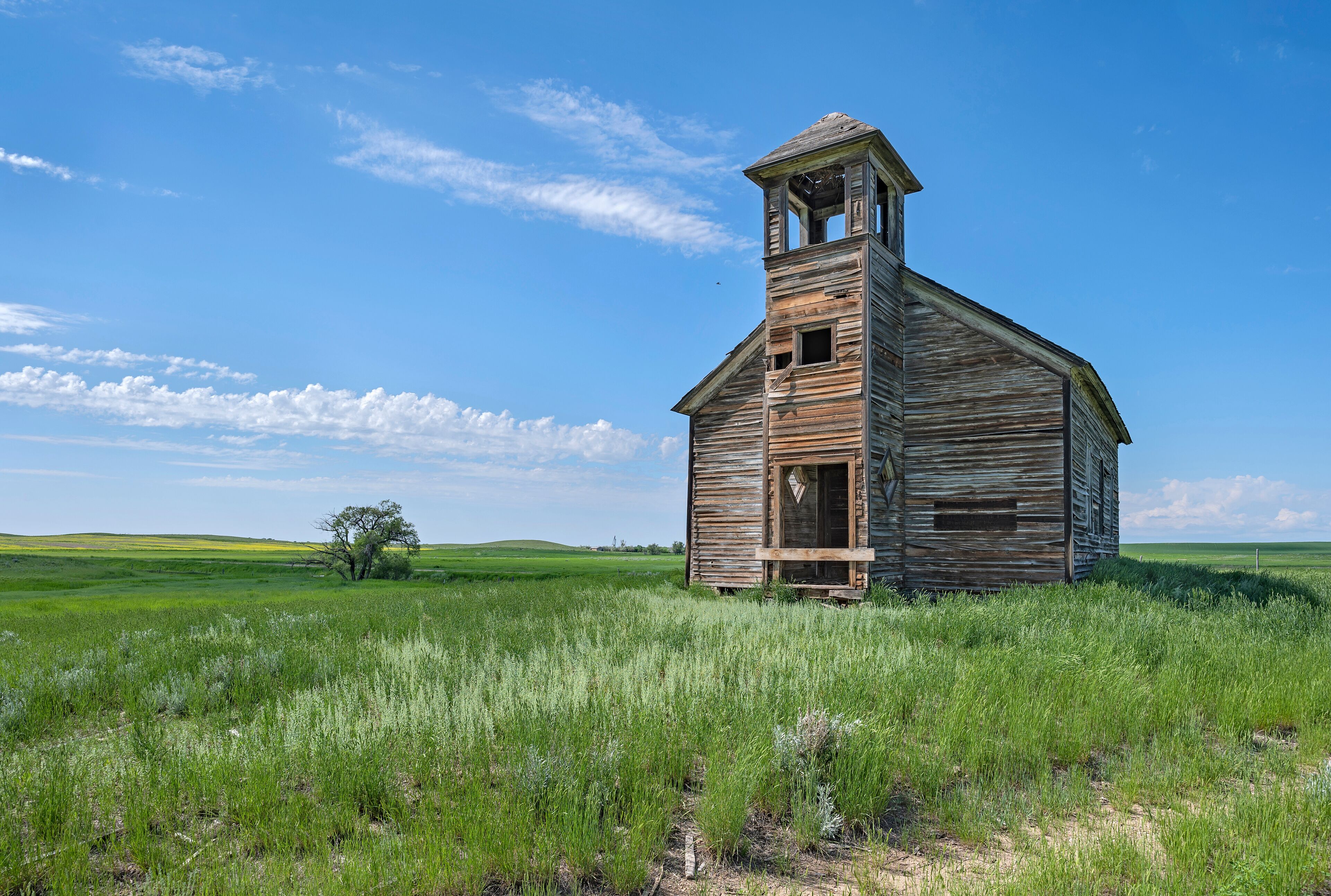 Abandoned wooden Cottonwood Lutheran Church on the plains near Havre, Montana, USA
