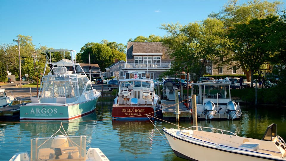 A marina with several boats docked, including 'ARGOS' and 'DELLA ROSE'.