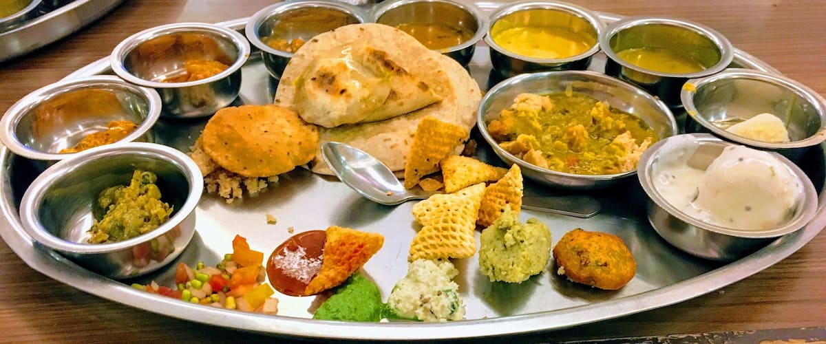 Presenting the good old Indian Thali. Literally meaning 'plate', the idea is to offer all the 6 different flavor profiles of sweet, salt, bitter, sour, astringent and spicy on one single plate.
Pictured here is a Vegetarian Rajasthani Thali that was subsequently wiped clean resulting in a most satisfactory food coma :) #GoodEats