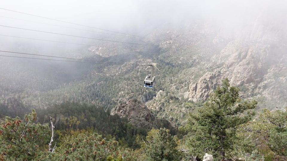 Ride the tram up to Sandia Park in Albuquerque, New Mexico to see some spectacular views.
A major bonus if you do this around hot air balloon festival week and you will see balloons hovering over the city. However the line/queue to ride the tram from the base can be quite long.