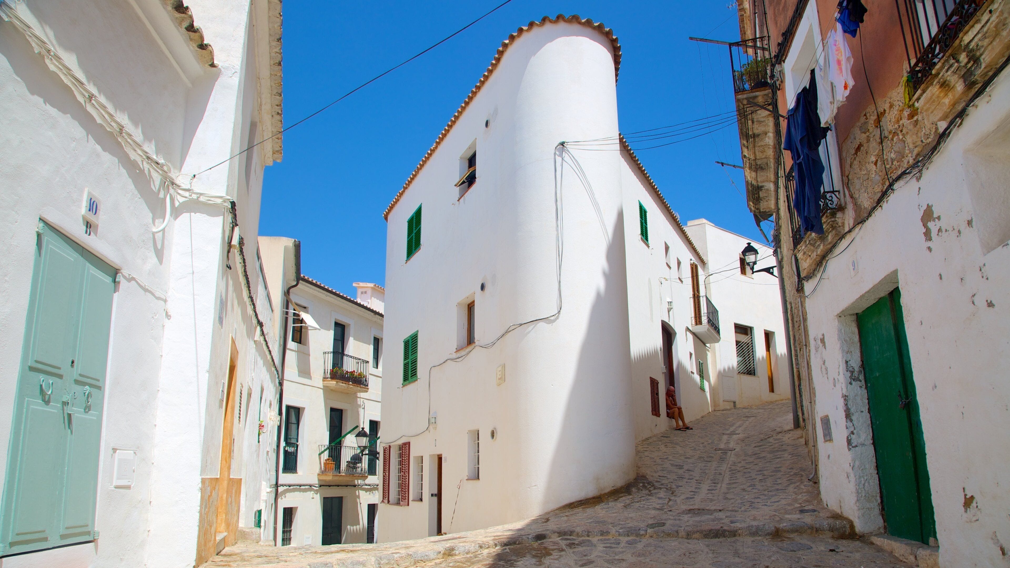 Ibiza Town featuring a house, a small town or village and heritage architecture
