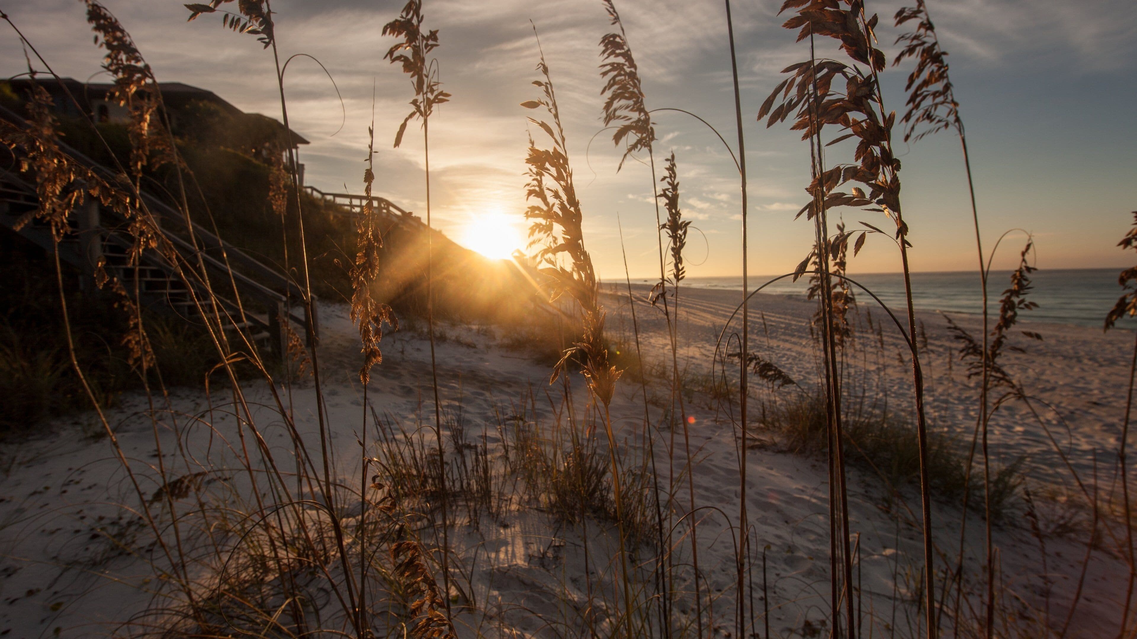Seagrove Beach featuring a sunset and a beach