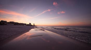 Fort Walton Beach which includes a sunset and a sandy beach